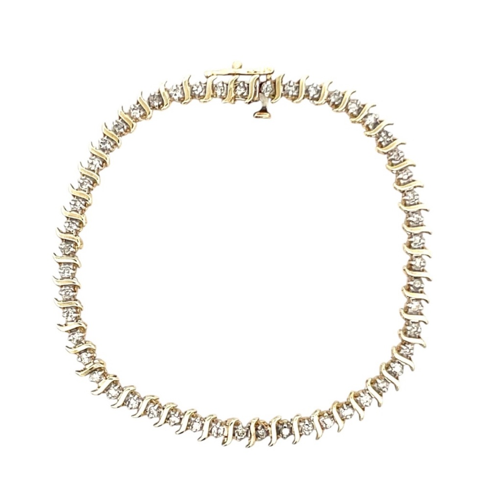One carat diamond tennis bracelet set in 10k gold Bracelet